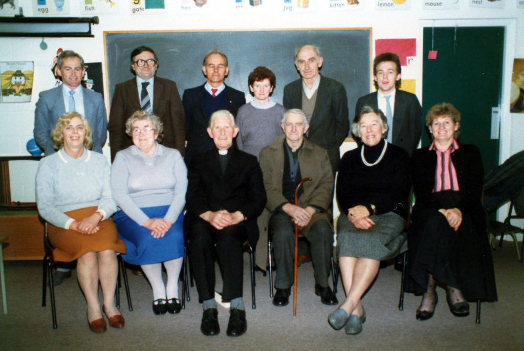 BPM Committee in 1989: Front (L to R): Sheila Barry (RIP), Norrie Donegan (RIP), Fr. Michael Stack (RIP), Dan Kissane (RIP), Maureen Foley (RIP), Mary Dee. Back (L to R): David Kissane, John Keane, Michael Barry, Eileen Mason (RIP), Sean Foran (RIP), Micheál Carr