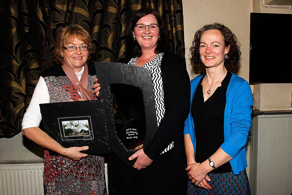 Accepting their awards in the “Adult Photographic Competition” were Bridget O’Connor and Breda Canty. Front: Bridget O’Connor, Breda Canty, Elaine Nolan.